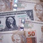 Mercado: Dólar cai a R$ 4,97 e Ibovespa sobe com tensão